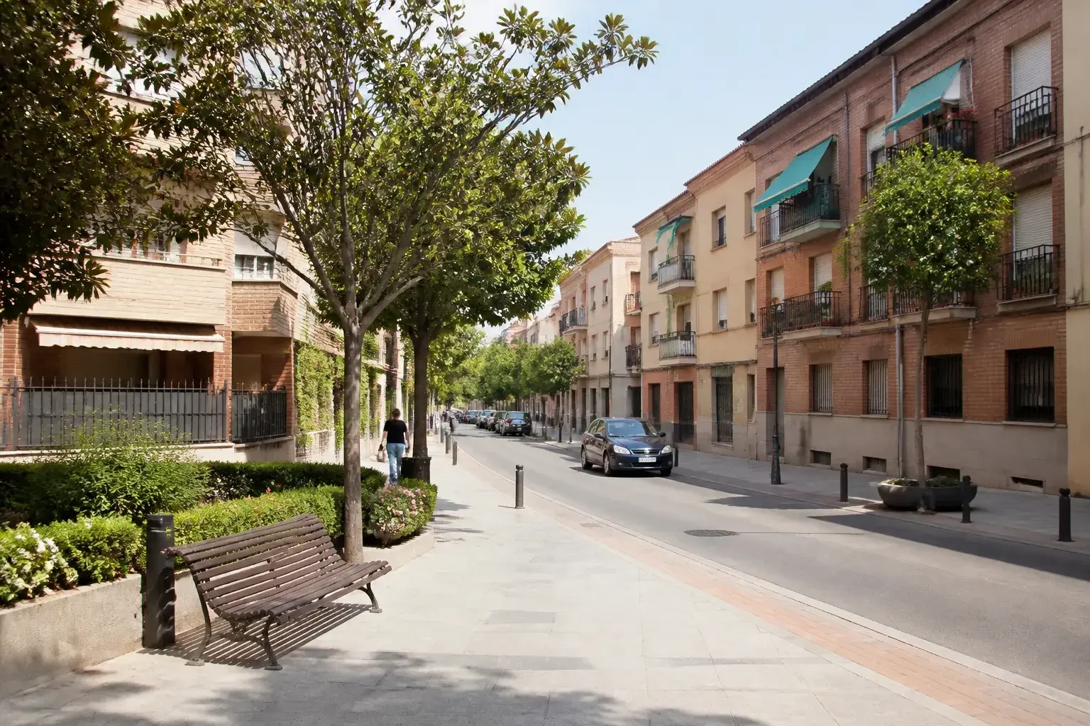 Calle de Getafe con ambiente de barrio y viviendas de baja altura.